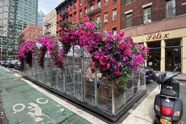 see through outdoor dining tent with flowers